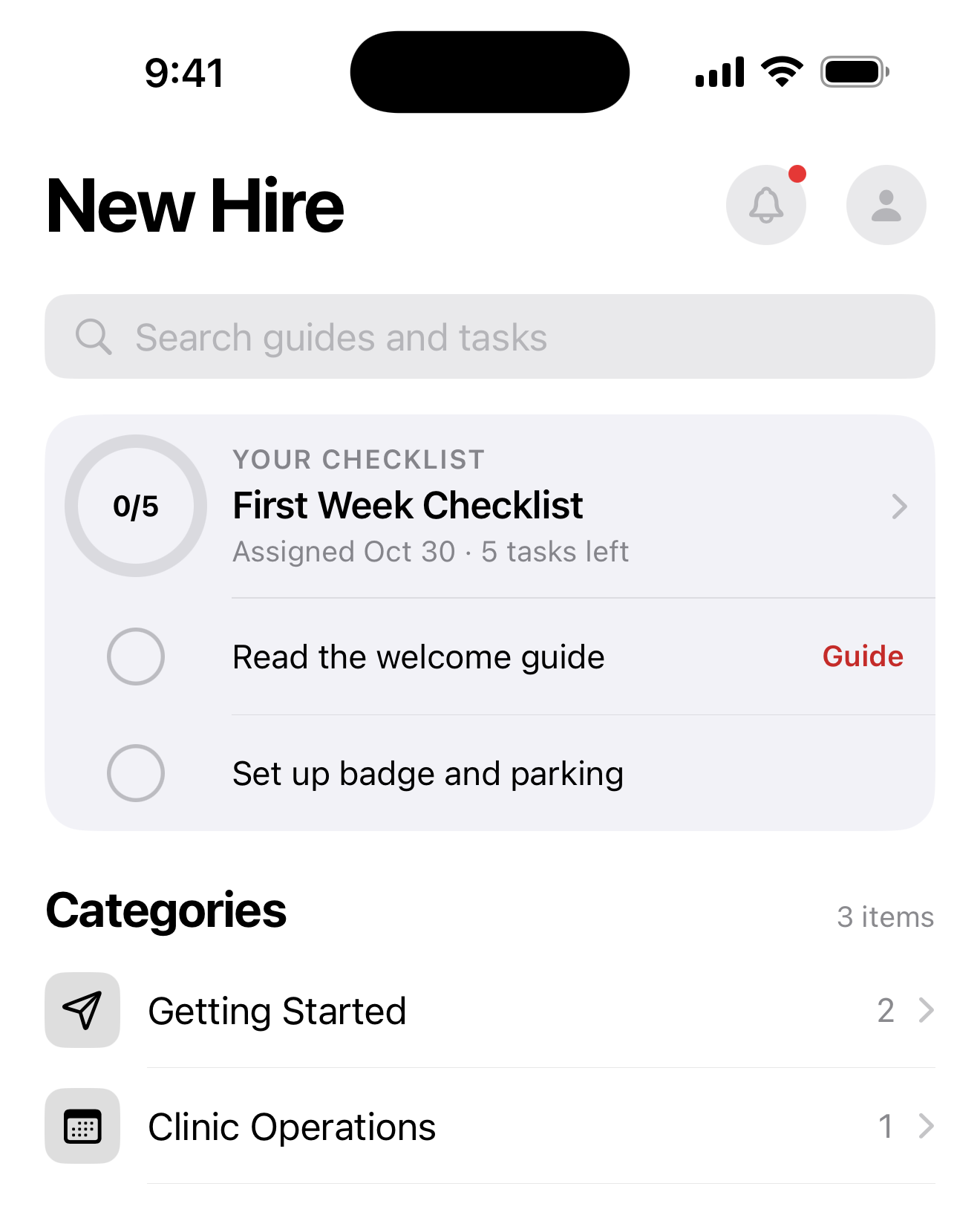 The New Hire screen with a First Week Checklist at zero of five tasks, and guide categories for Getting Started and Clinic Operations.